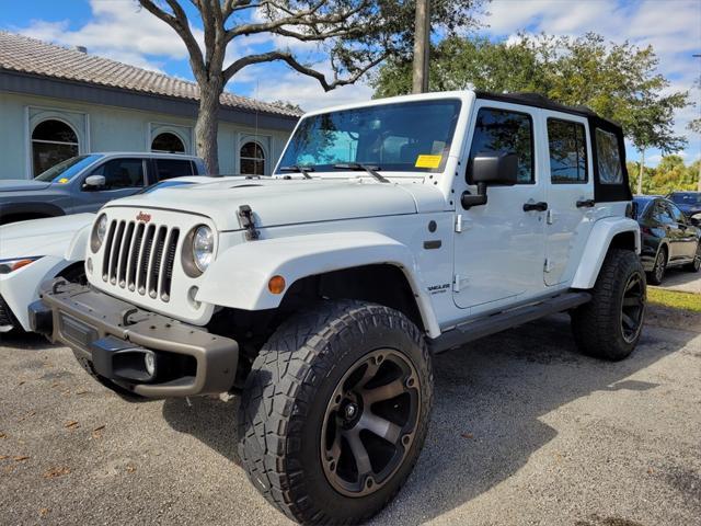 used 2016 Jeep Wrangler Unlimited car, priced at $16,590