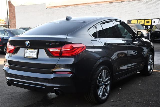 used 2018 BMW X4 car, priced at $23,495