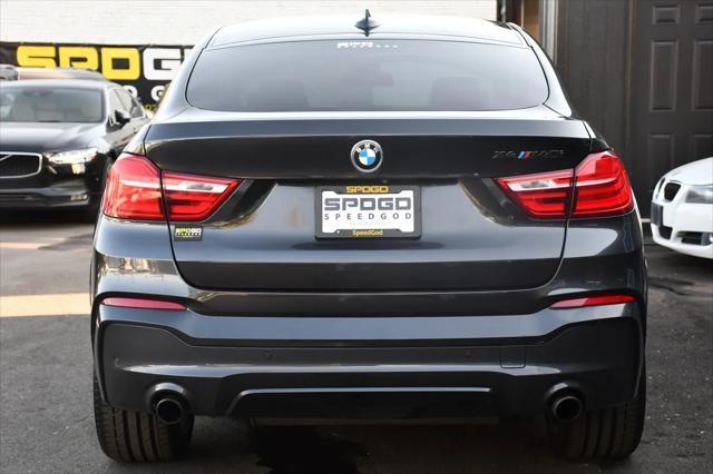 used 2018 BMW X4 car, priced at $23,495