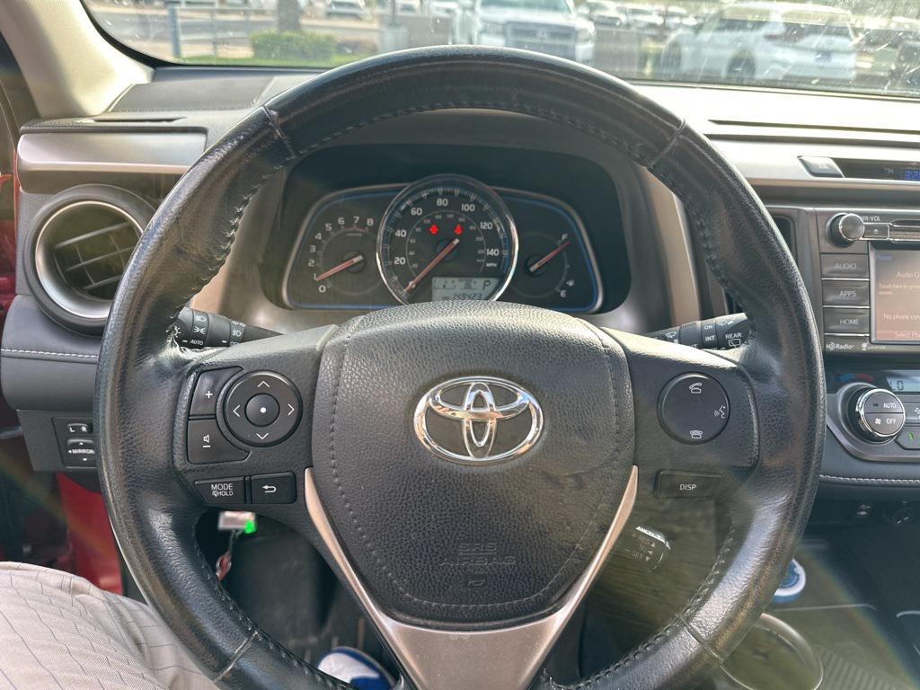 used 2014 Toyota RAV4 car, priced at $14,000