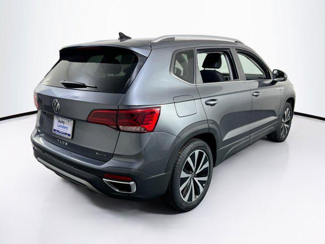 used 2023 Volkswagen Taos car, priced at $24,669