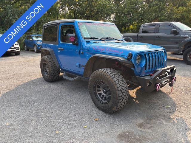 used 2023 Jeep Wrangler car, priced at $29,643