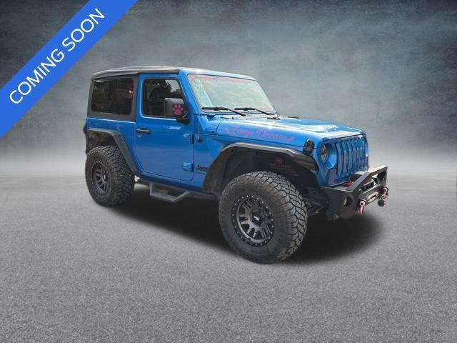 used 2023 Jeep Wrangler car, priced at $29,643