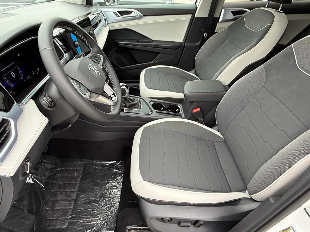new 2025 Volkswagen Taos car, priced at $28,064