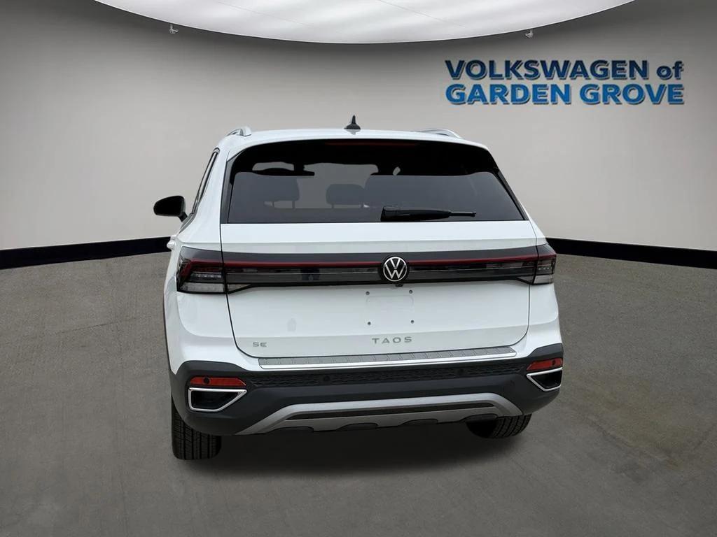 new 2025 Volkswagen Taos car, priced at $28,064