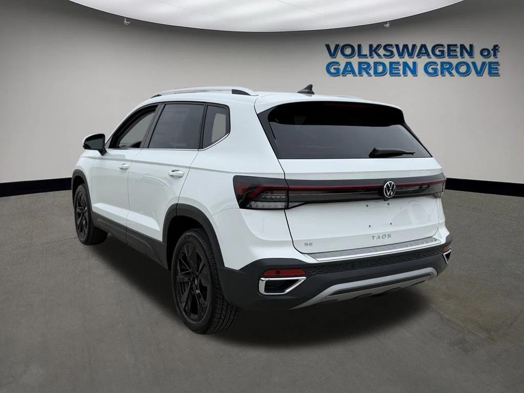 new 2025 Volkswagen Taos car, priced at $28,064
