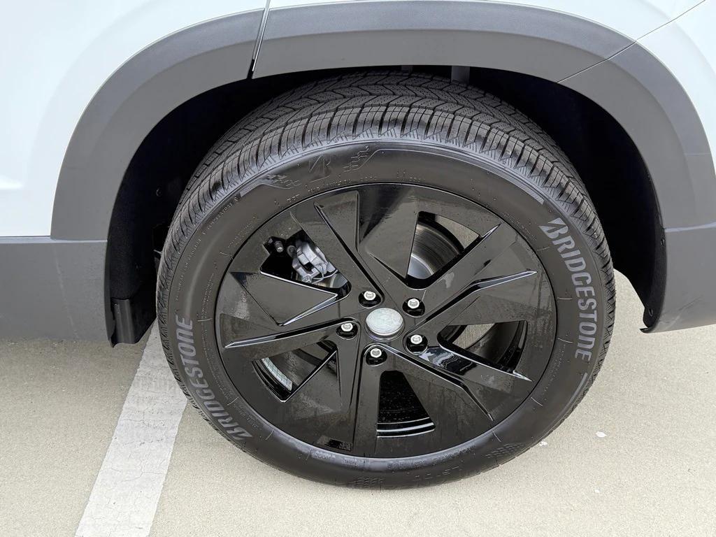 new 2025 Volkswagen Taos car, priced at $28,064