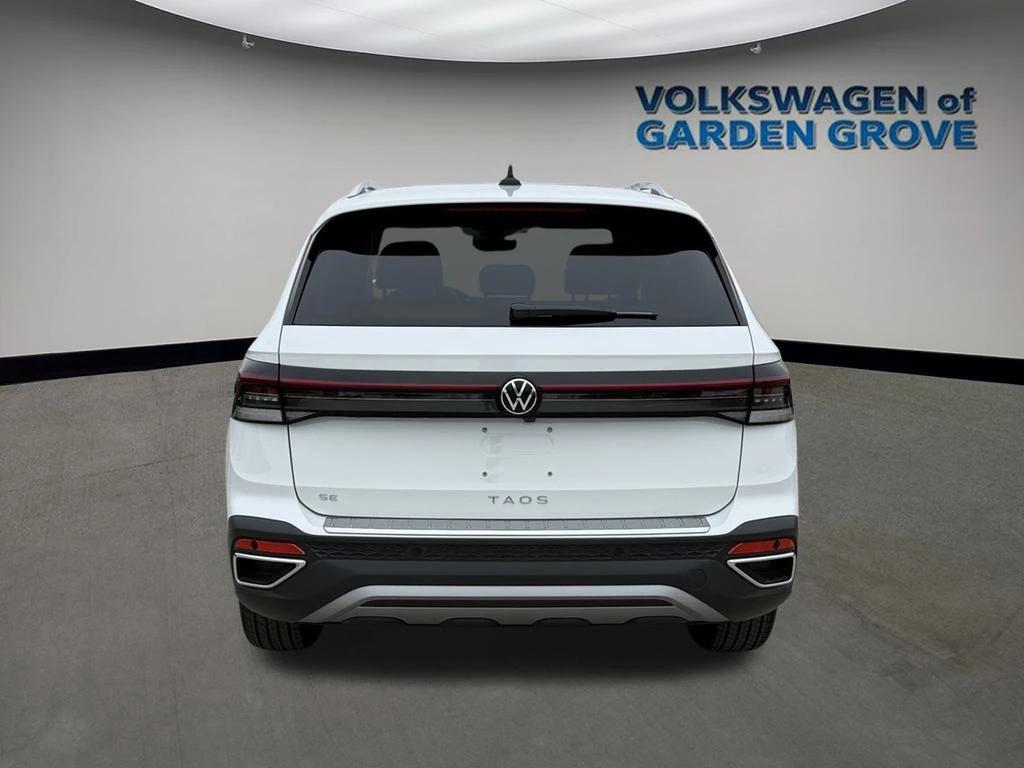 new 2025 Volkswagen Taos car, priced at $28,064