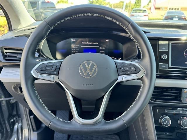 used 2023 Volkswagen Taos car, priced at $21,499