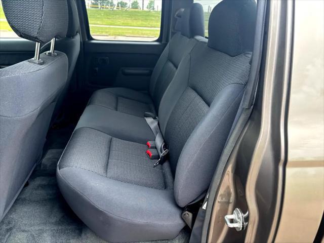 used 2004 Nissan Frontier car, priced at $14,999