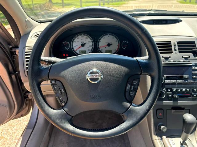 used 2002 Nissan Maxima car, priced at $9,999