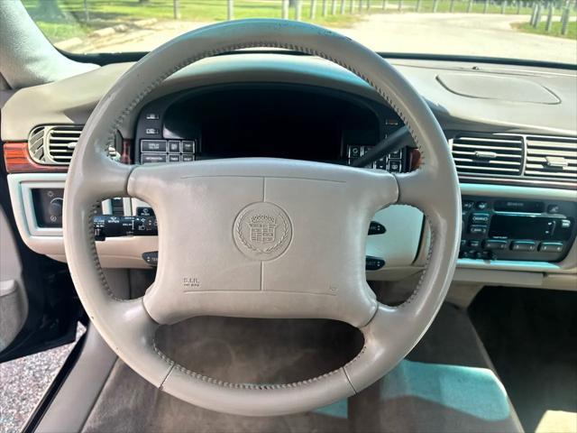used 1999 Cadillac DeVille car, priced at $9,999