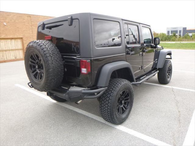 used 2015 Jeep Wrangler Unlimited car, priced at $24,994