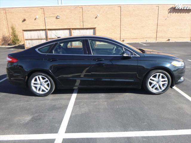 used 2014 Ford Fusion car, priced at $10,695