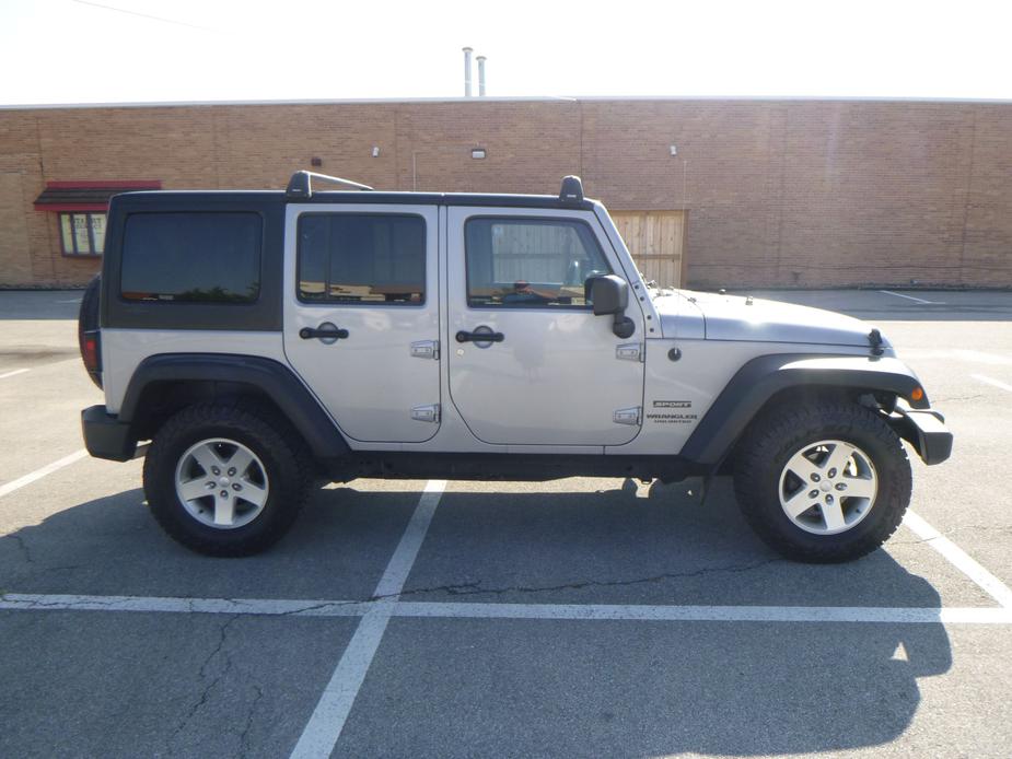 used 2015 Jeep Wrangler Unlimited car, priced at $24,495