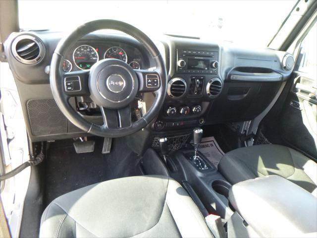 used 2015 Jeep Wrangler Unlimited car, priced at $24,495