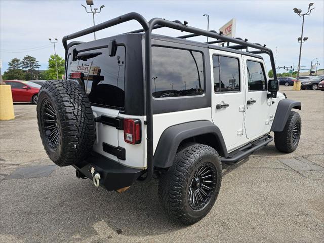 used 2014 Jeep Wrangler Unlimited car, priced at $18,942