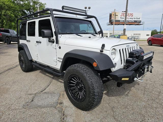 used 2014 Jeep Wrangler Unlimited car, priced at $18,942