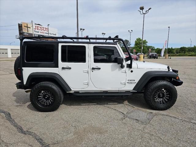 used 2014 Jeep Wrangler Unlimited car, priced at $18,942