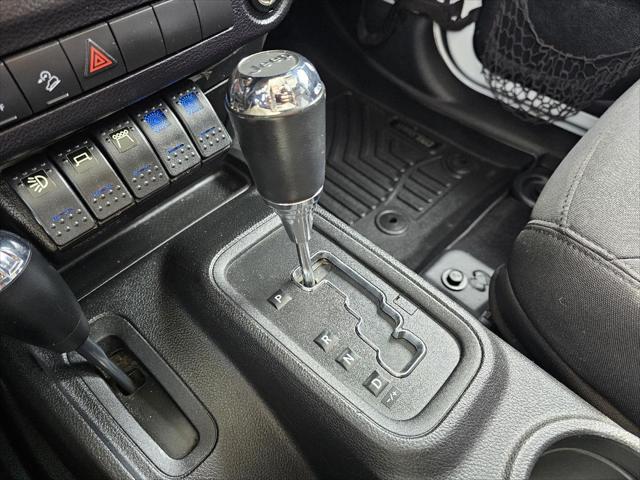 used 2014 Jeep Wrangler Unlimited car, priced at $18,942