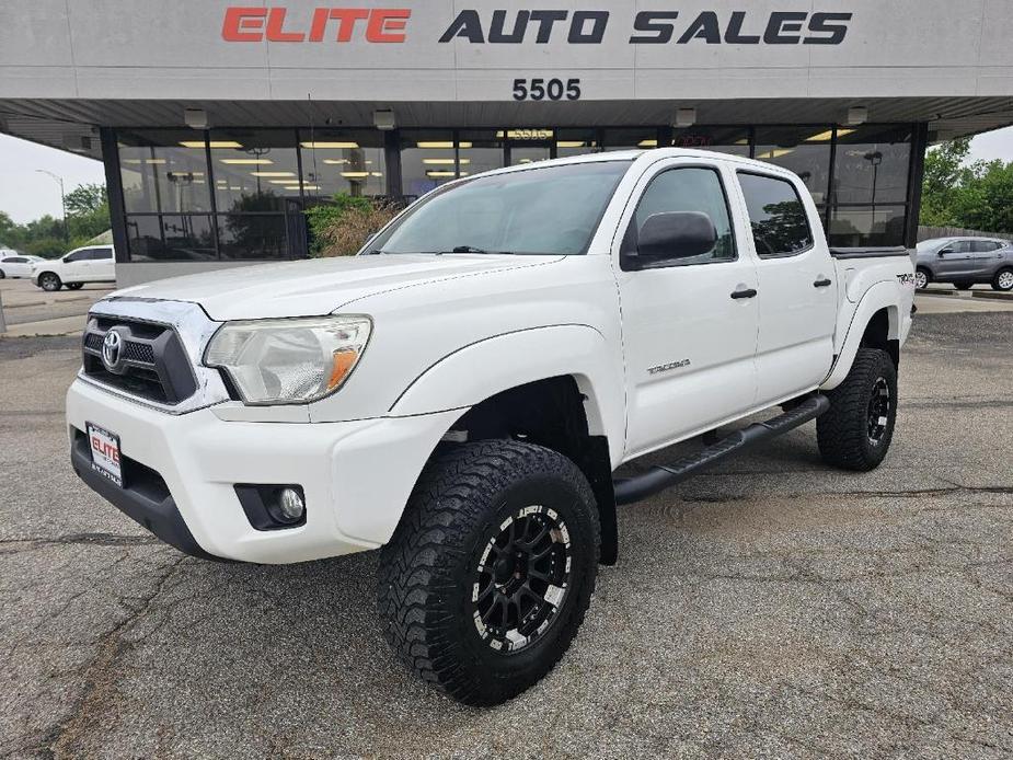 used 2015 Toyota Tacoma car, priced at $23,600