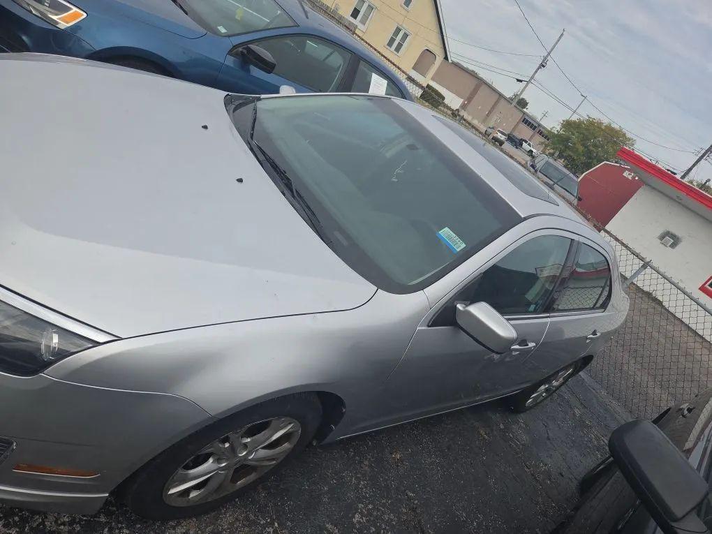 used 2012 Ford Fusion car, priced at $6,750