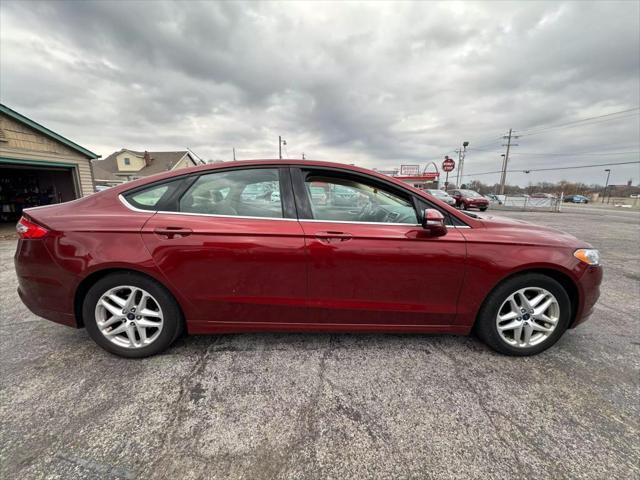 used 2014 Ford Fusion car, priced at $4,900