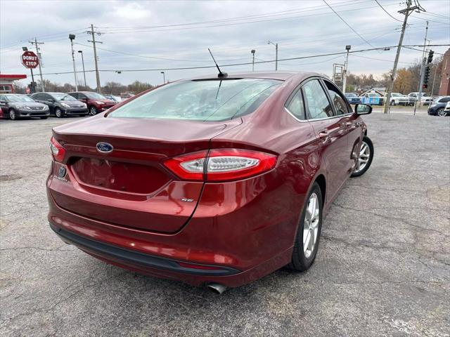 used 2014 Ford Fusion car, priced at $4,900