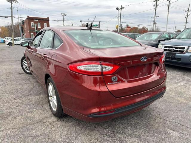 used 2014 Ford Fusion car, priced at $4,900