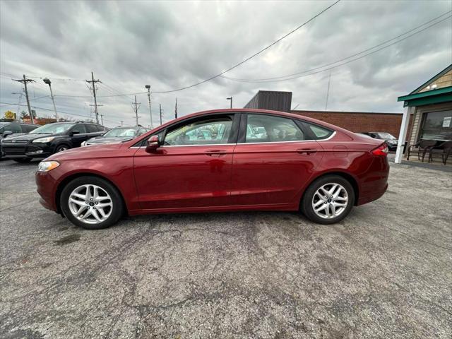 used 2014 Ford Fusion car, priced at $4,900