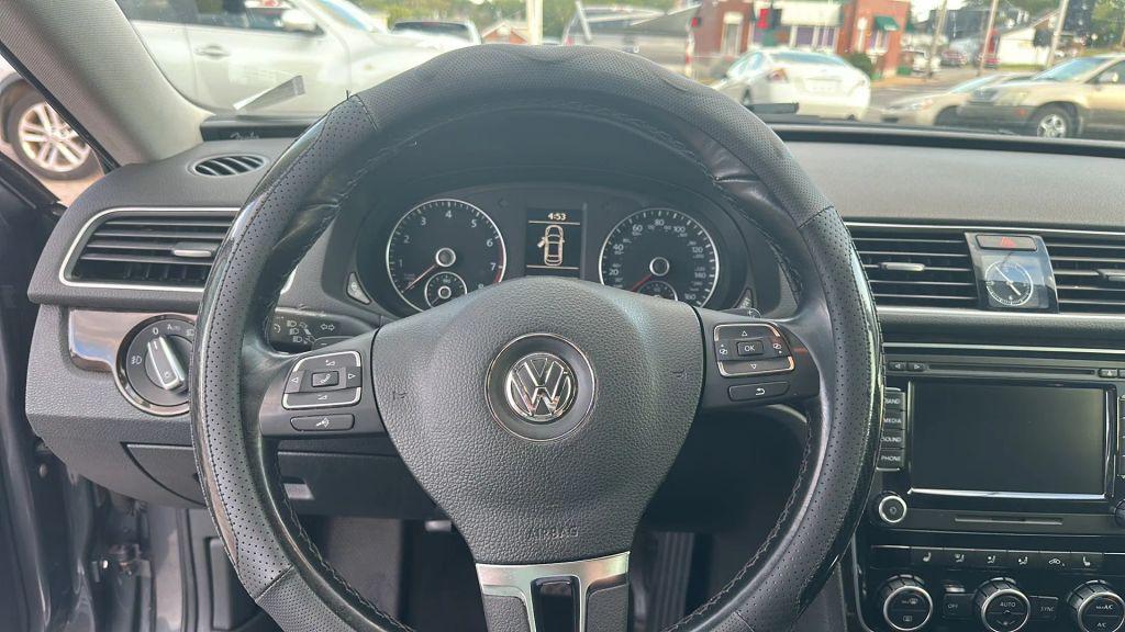 used 2014 Volkswagen Passat car, priced at $5,900