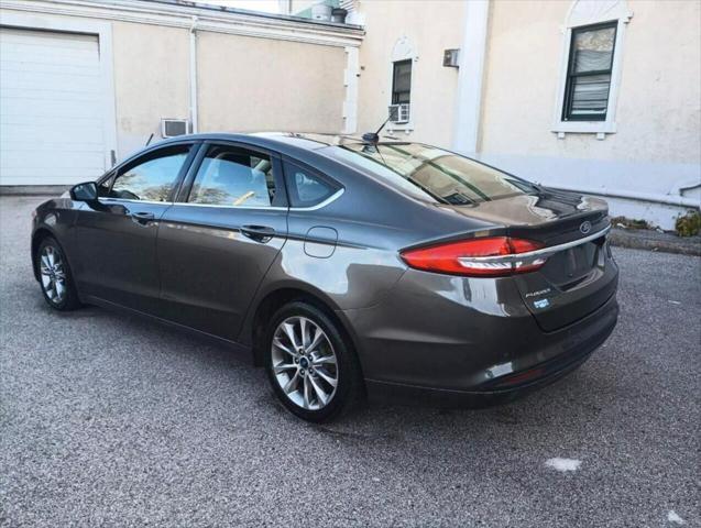 used 2017 Ford Fusion car, priced at $6,900