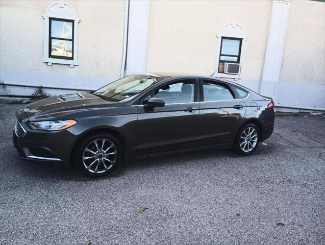 used 2017 Ford Fusion car, priced at $6,900