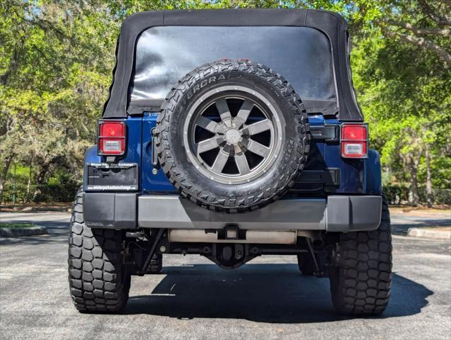 used 2013 Jeep Wrangler Unlimited car, priced at $14,988