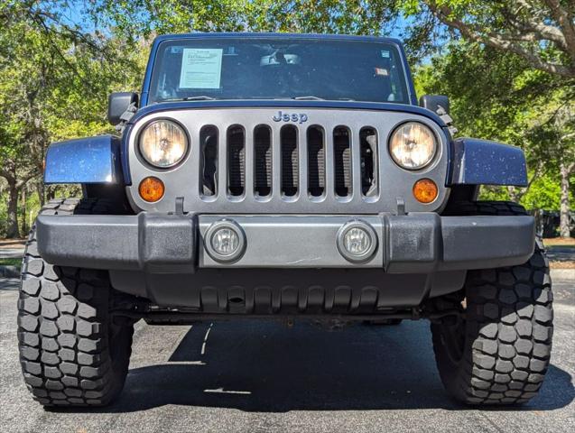 used 2013 Jeep Wrangler Unlimited car, priced at $14,988