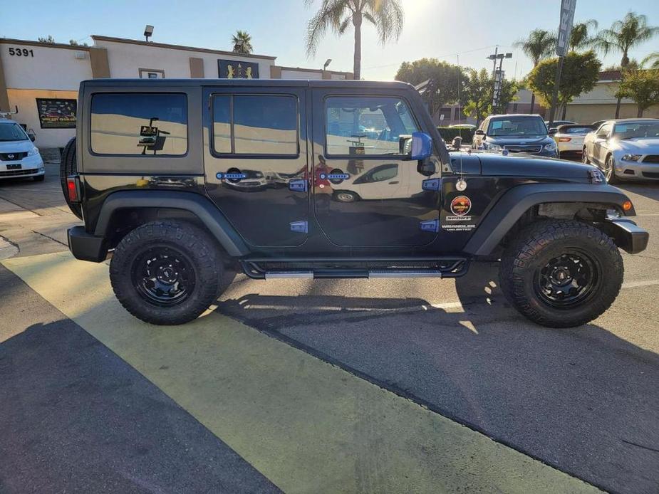 used 2016 Jeep Wrangler Unlimited car, priced at $19,499