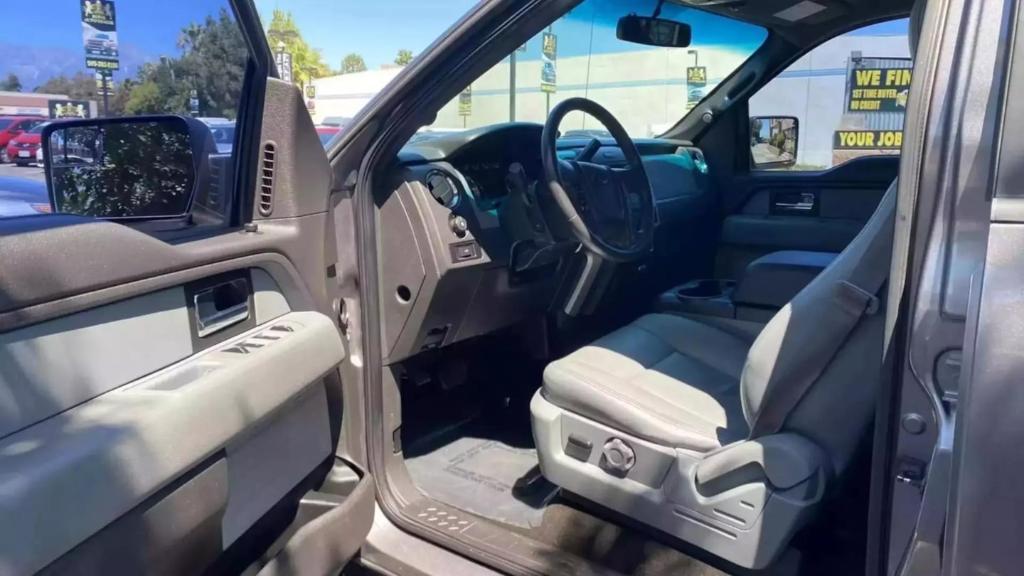 used 2014 Ford F-150 car, priced at $14,999