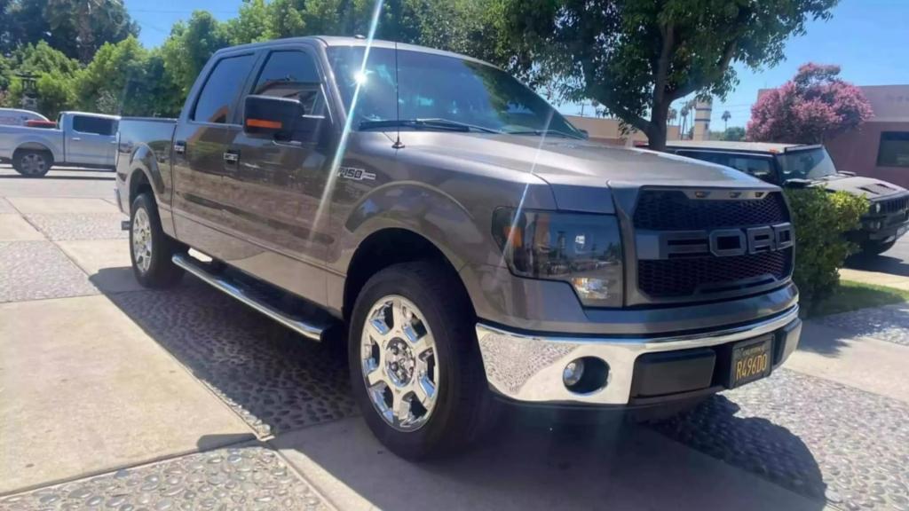 used 2014 Ford F-150 car, priced at $14,999