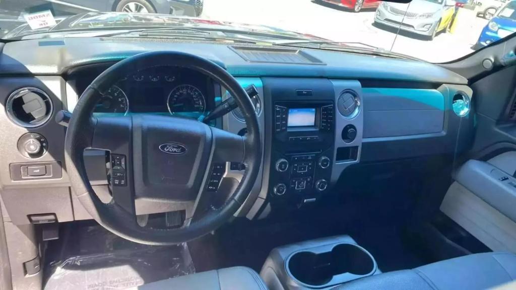 used 2014 Ford F-150 car, priced at $14,999