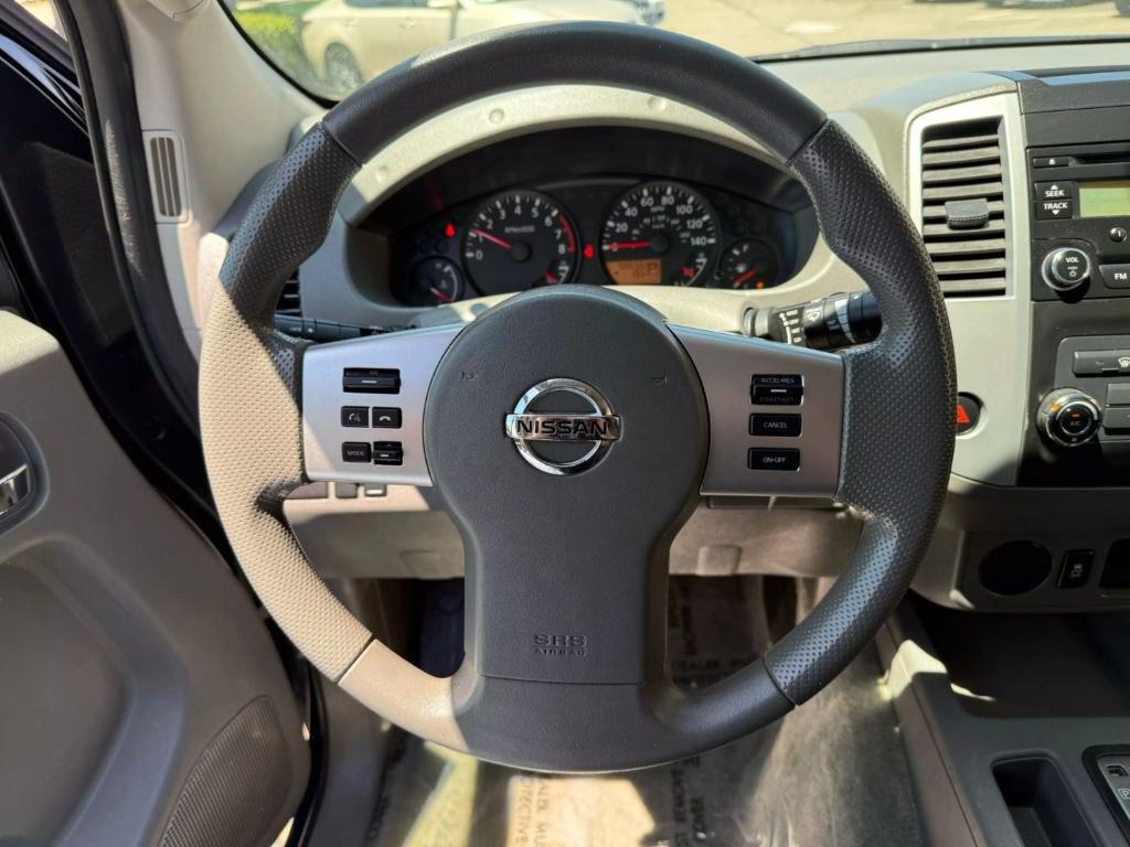 used 2015 Nissan Frontier car, priced at $13,999