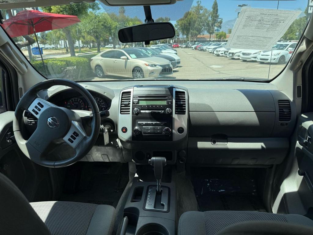 used 2015 Nissan Frontier car, priced at $13,999