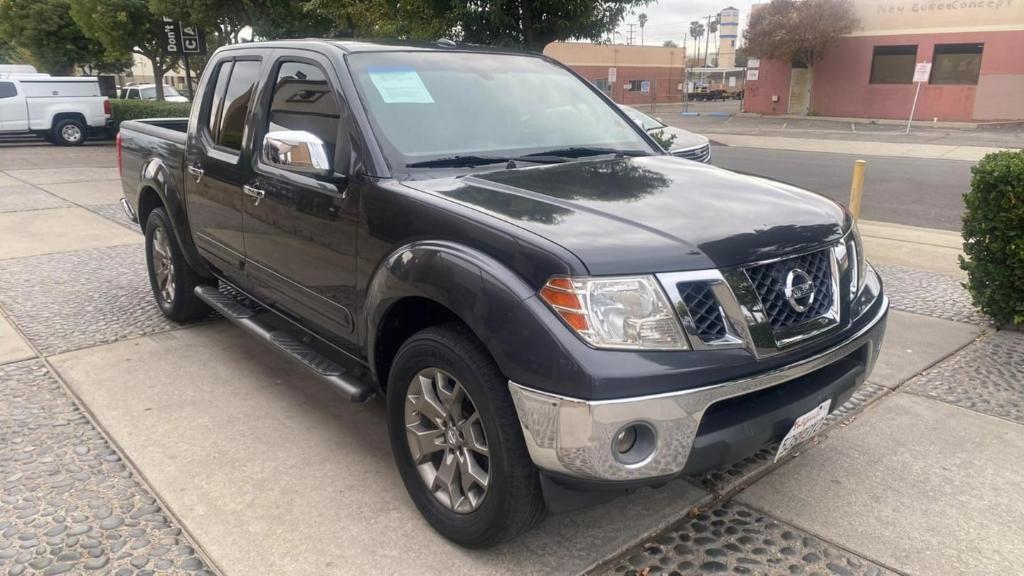 used 2015 Nissan Frontier car, priced at $15,499