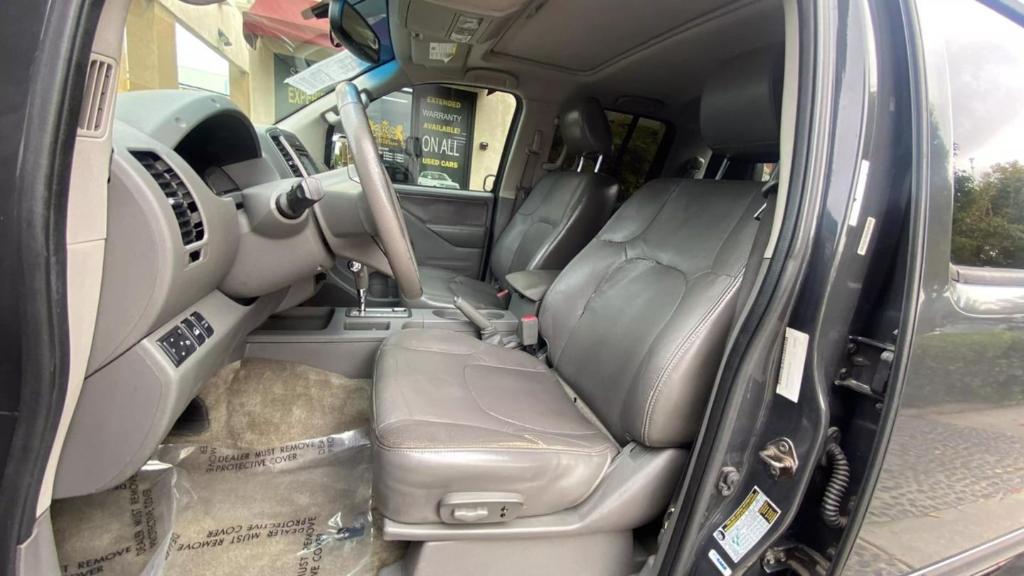 used 2015 Nissan Frontier car, priced at $15,499