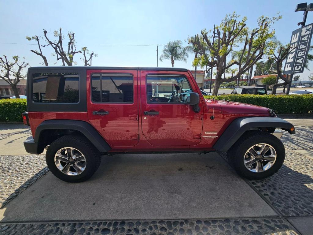 used 2013 Jeep Wrangler Unlimited car, priced at $17,999
