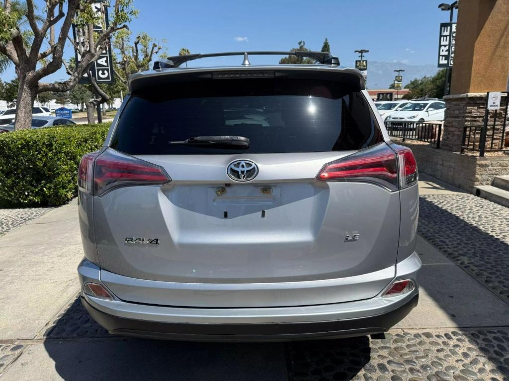 used 2018 Toyota RAV4 car, priced at $10,499