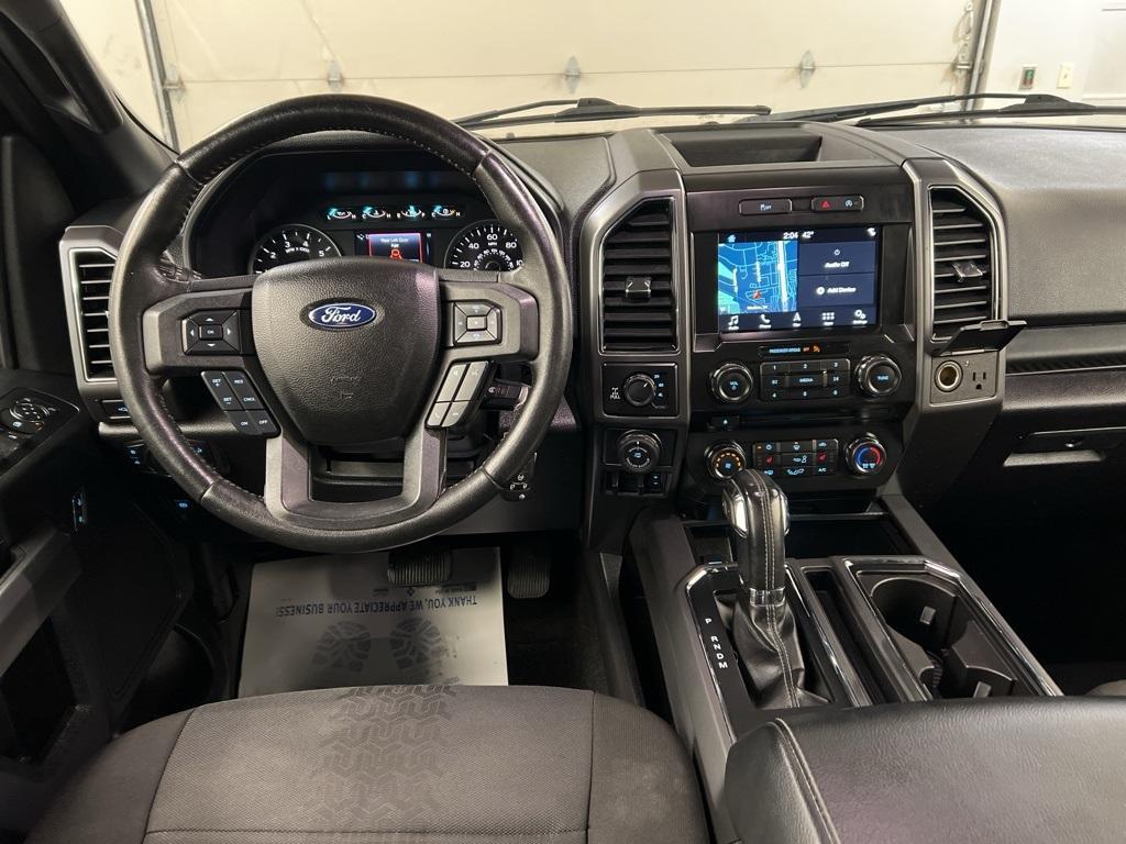 used 2018 Ford F-150 car, priced at $27,832