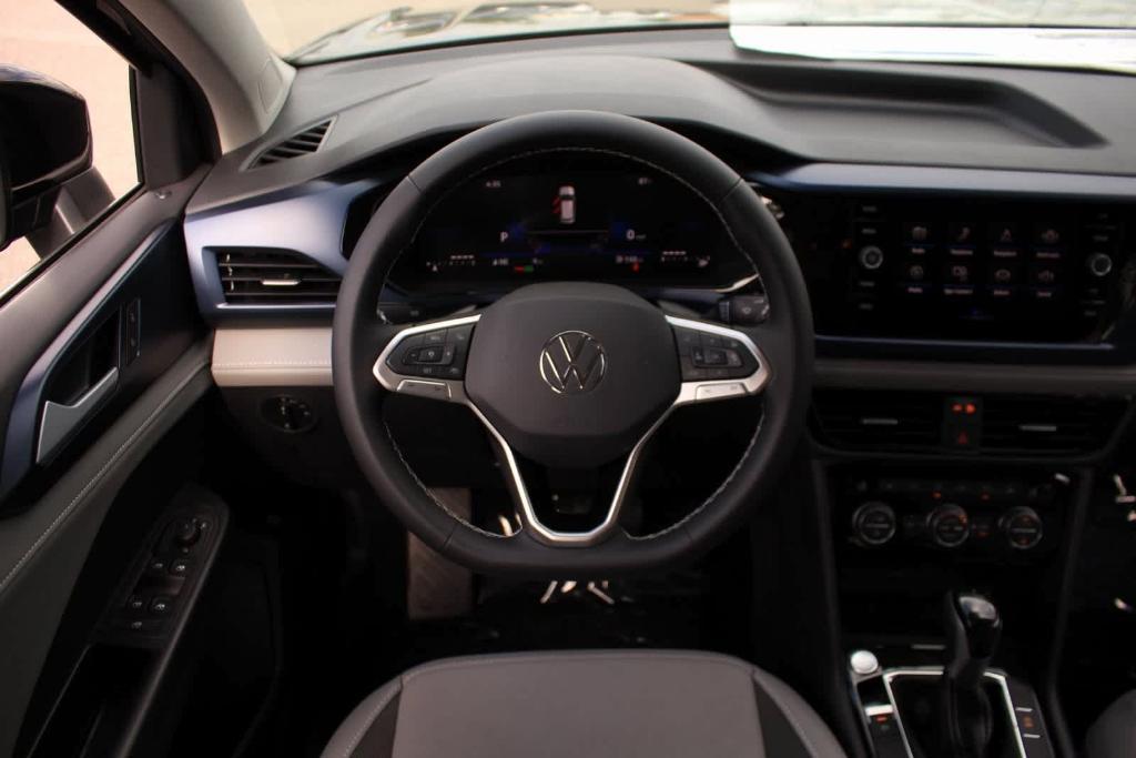 new 2024 Volkswagen Taos car, priced at $28,621