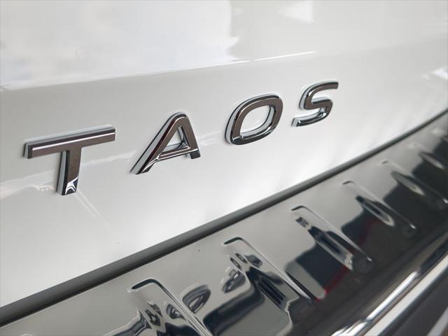 new 2024 Volkswagen Taos car, priced at $23,896