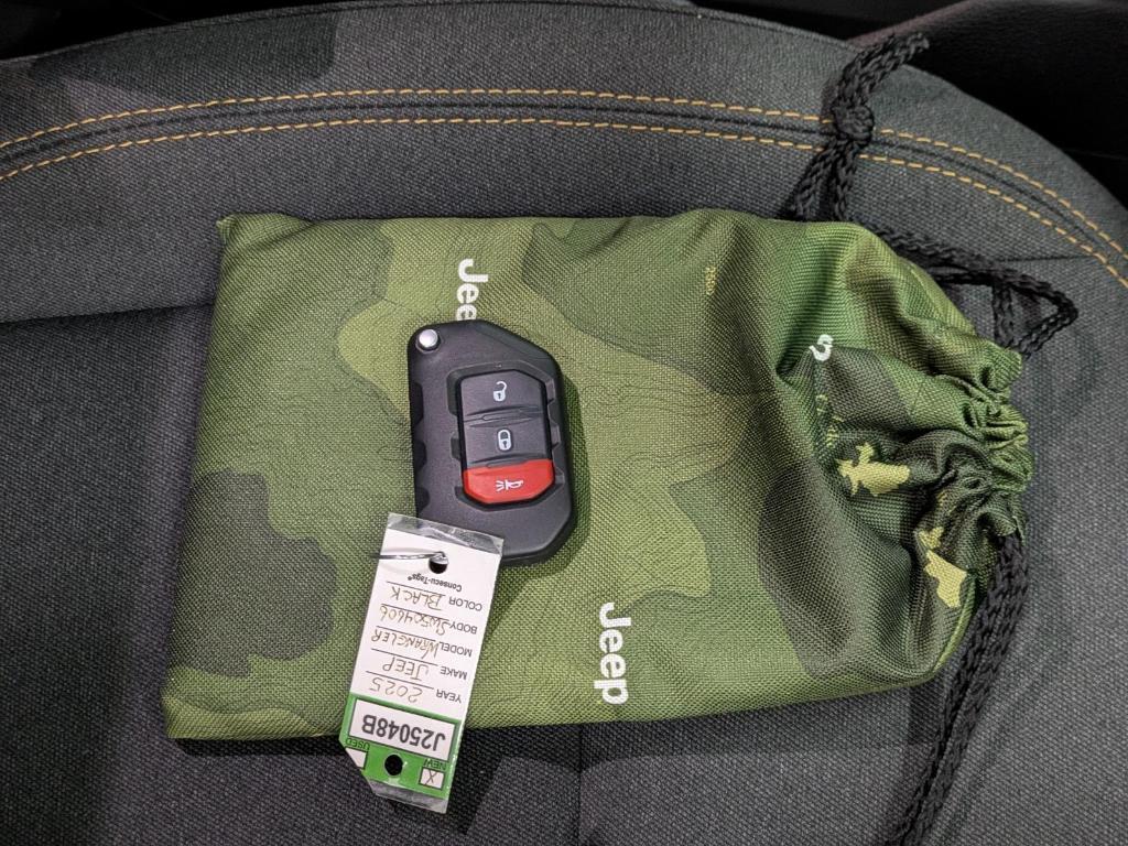 used 2025 Jeep Wrangler car, priced at $28,990