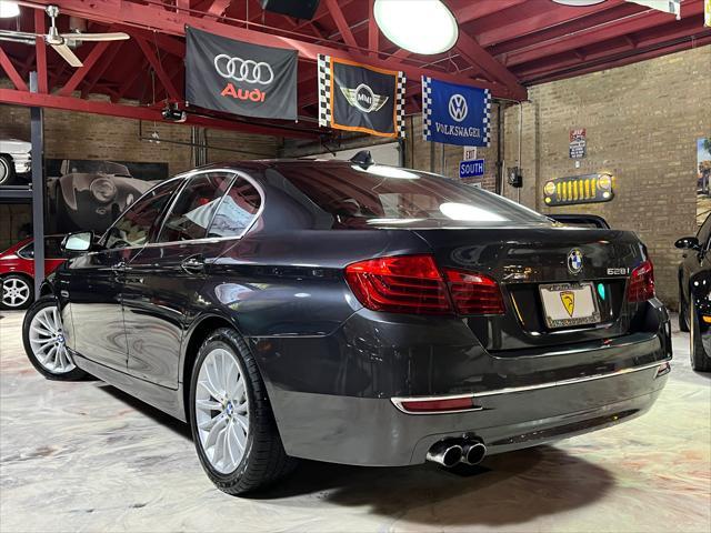 used 2015 BMW 528 car, priced at $13,985